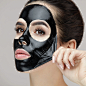 456c12f16d8c3c20c4bcdb177e308ed9_womanwcharcoalpeeloffmask-2454539981