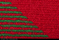 Handmade knit green and red background - stock photo