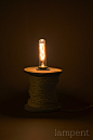 Spool lamp : This lamp is made from an old wooden spool. Brown fabric coated cable and decorative Edison light bulb are used.