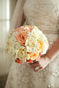 bride holding a white, ivory, and peach rose bouquet - photo by Washington DC wedding photojournalist Paul Morse