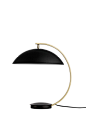 Shelter table lamp designed by Henrik Pedersen. Black metal with brass arm