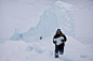 Viewers' Choice for Places: Iceberg Hunters - Chipping ice off an iceberg is a common way for the Inuit community to retrieve fresh drinking water while on the land. During a weekend long hunting trip, we came upon this majestic iceberg frozen in place. I