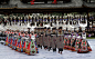 Free Men and Women in Traditional Clothing Dancing to Celebrate New Year  Stock Photo