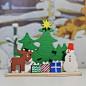 Christmas wood toy decoration   Christmas tree : Adorable Christmas decoration Perfect for the holiday season! supplied with gift box   Approximate size - 71 x 55 mm Box size - 90 x 90 x 30mm  Please note, since wood is a natural material, color and textu
