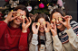 Beautiful family celebrating Christmas at home photo