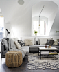 sloped ceiling living room in shades of grey