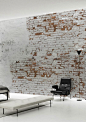 Create your own industrial wall in no time with this Plaster Brick Wall Wallpaper Mural by Behangfabriek