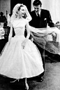 Audrey Hepburn and designer Hubert de Givenchy on the set of Funny Face, (1957)