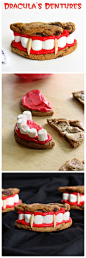Dracula's Dentures - made from chocolate chip cookies, red frosting, and marshmallows. #halloween treat