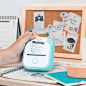 Phomemo T02 Mini Pocket Thermal Printer | Cyan : Phomemo T02 Portable Bluetooth Mini Pocket Thermal Printer have 2 color to select. T02 printer kitty-shaped silicone cover with three color options is so protective that it acts as a cushion to prevent any 