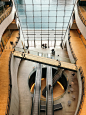 aerial photo of person using escalator indoors