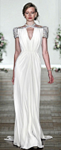 jenny packham.  love the sharp shoulder.  femme but modern.