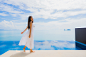 portrait-young-asian-woman-relax-smile-happy-around-swimming-pool-hotel-resort