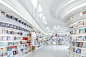 An All-White Bookstore in Xi’an, China That Lets the Books Add the Color : Zhongshu Bookstore is a bookstore in Xi’an, China designed by Wutopia Lab that feels quite magical with all-white surfaces, curvy walls, and plenty of space to roam around while sh