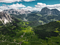An aerial view of a valley and mountains