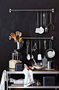 black kitchen wall with accessories via williams-sonoma / sfgirlbybay