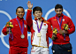 【第13金】
北京时间8月1日凌晨2点，2012年伦敦奥运会举男子69公斤级展开争夺，林清峰以344公斤的总成绩为中国奥运代表团夺得本届奥运会的第13枚金牌，中国男举在这个级别上实现奥运三连冠。印尼选手特里亚特诺以333公斤的成绩获得银牌，罗马尼亚的马丁以332公斤的成绩获得银牌。图为林清峰挥手示意