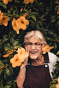 Woman Standing Near Yellow-petaled Flower