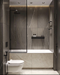 a modern bathroom with marble walls and flooring