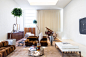 Image may contain Furniture Living Room Room Indoors Table Coffee Table Interior Design and Couch