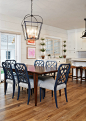 Example of a large transitional medium tone wood floor and brown floor kitchen/dining room combo design in Grand Rapids with gray walls