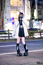 Harajuku Girl in Faux Fur Coat, CyborgLabo Face Mask, Cutout Top, Miniskirt, Leg Covers & Demonia Platform Shoes – Tokyo Fashion