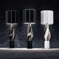 Nightshade, lighting concept : Sculptural lighting object based on three identical rotating shapes, executed in metal of various colors (black nickel, nickel, bronze, rose gold) and various stones (galaxy granite, carrara marble).