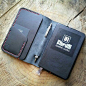 A 140x90 moleskine cover with card and note...: 