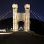 Les Éclairagistes Associés selected Lumenfacade luminiares in a warm 3000K. The luminaires are installed underneath the bridge and aimed downward to emphasise the structure’s unreinforced concrete and its arch.