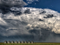 Thunderheads over silos in Saskatchewan, Canada