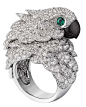 @Cartier Fabuleux parrot watch and ring; watch and ring in rhodium-plated white gold set with brilliant-cut diamonds, beak in mother of pearl, eyes set with emeralds.