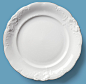 Directly Above Of White Plate On Blue Background