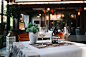 Wine set for two in a nice restaurant Table set for two with wine glasses in the restaurant. Restaurant Stock Photo