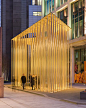 Regents Place Pavilion  The Pavilion is created by a field of steel rods supporting a thin plate canopy 8M above the streetscape.  By night the visual transparency of the structure is reinforced by up-lighting to the clusters of rods - the pavilion appear