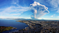 General 1920x1080 cityscape city building Chile nature volcano eruption smoke mountains snowy peak water sea hills house clouds bird's eye view aerial view coast