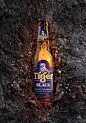 Tiger - Black &amp; White : Strikingly bold. Refreshingly smooth. Unexpected in every way. Introducing the all-new Tiger Black and White. The 85-year old Tiger Beer has been making its rounds at popular spots in Singapore to unveil their new flavours. Tig