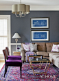 Purple chairs and Sherwin Williams "Peppercorn" walls