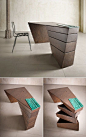 This twisted Desk design appears almost sculptural. Unique office furniture.: 