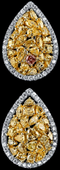 ancy colored diamond earrings, by Tamir. A unique composition of Natural fancy colored diamonds, demonstrated in a variety of shapes, sizes and hues, totaling 5.03ct total, surrounded by 1.01ct total of round brilliant white diamonds. Via 1stdibs.@北坤人素材