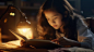 一个女孩在台灯下的夜读读写台灯认真学习读书