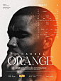 This may contain: an orange poster with a man's face in the center and words above it