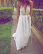 DIY a vintage wedding dress. Sleeves removed and changed to a halter neck with leather straps. By Shareen vintage