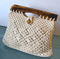 Vintage Macrame Bag With Wooden Beads And  Handles : This bag is very clean inside and out. No mentionable issues. Handmade in the Philippines. Muslin interior. One inside pocket Measures 9x 12 handle drop 2 Please measure carefully and feel free to ask m