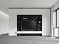 Modern empty room with minimalist tv backdrop 3d render the room has gray carpet floors Premium Photo