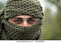 stock-photo-close-up-of-young-guy-in-shemag-keffiyeh-traditional-arabic-headgear-portrait-of-soldier-546264085.jpg (450×321)