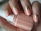 Peach nails with gold glitter