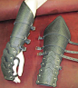 Gothic Reverse Clamshell Leather Armor Gauntlets. $89.99, via Etsy.: 