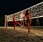 lights on a volleyball net at night, yesss need to do this: 