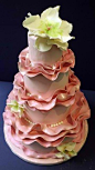 Lovely flower-adorned ruffle blush cake..