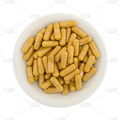 姜黄胶囊在白色的碗